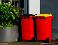 Colourful wheelie rubbish bins in the centre of Auckland City